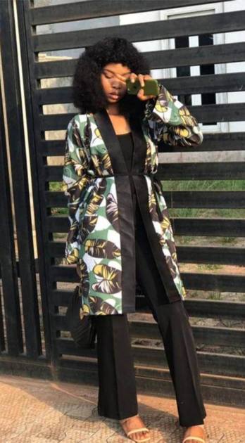 Leaf-print kimono jacket worn with black trousers
