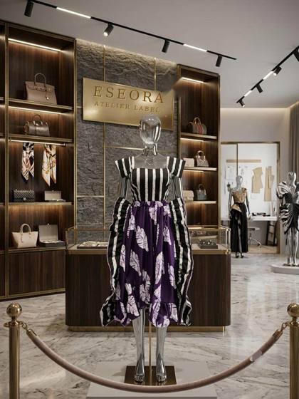 Striped and purple batik leaf-print dress on mannequin